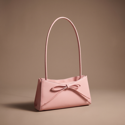 Women's pink structured shoulder bag with bow detail