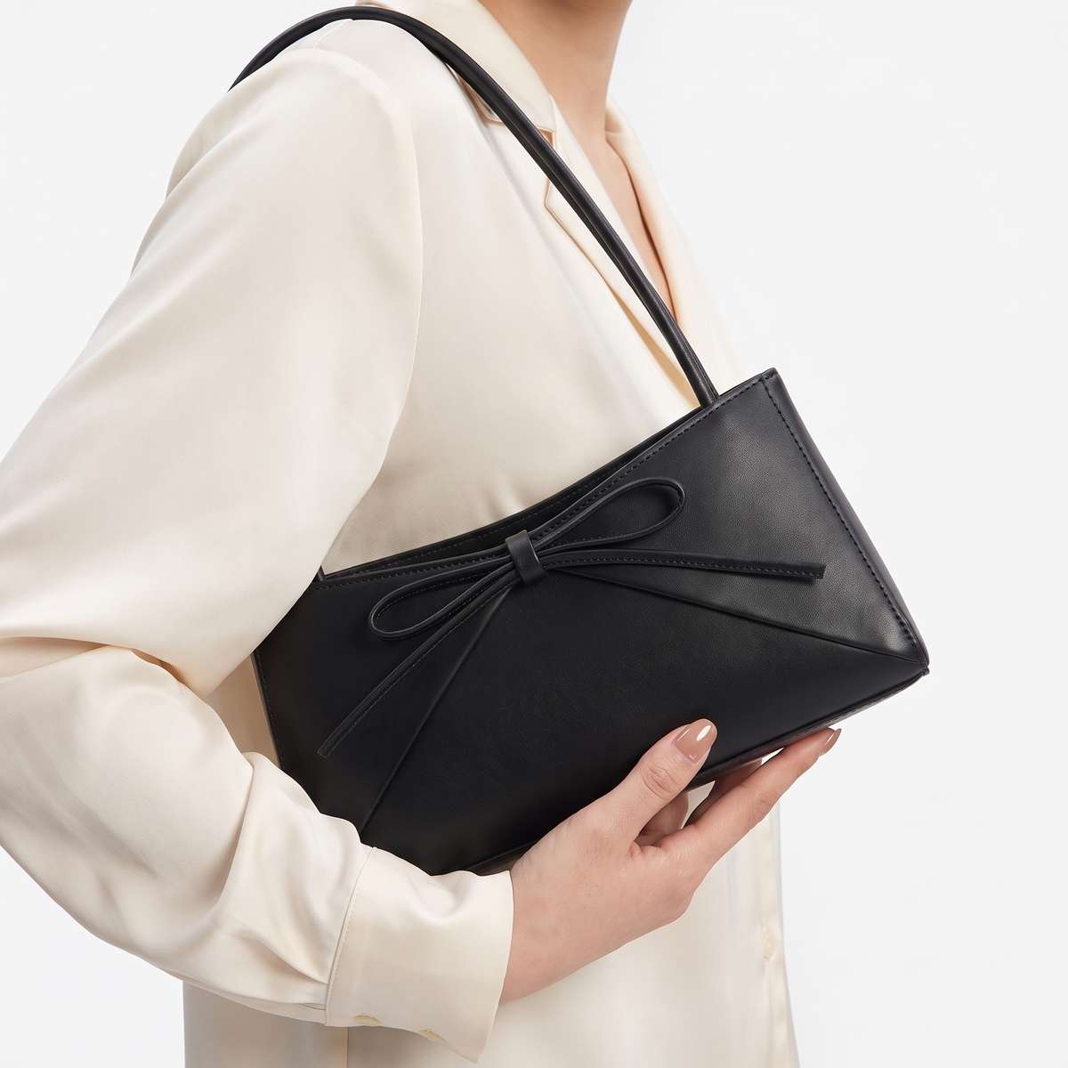 Black structured shoulder bag - worn view