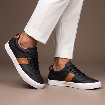 Men's black casual low-top sneakers with brown detail - worn view